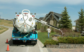 Hydrovac at work in residential location